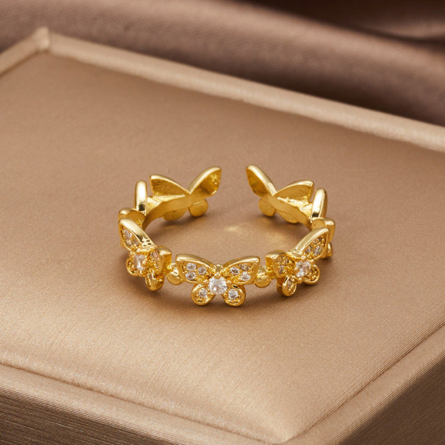 Bague ajustable papillons en or