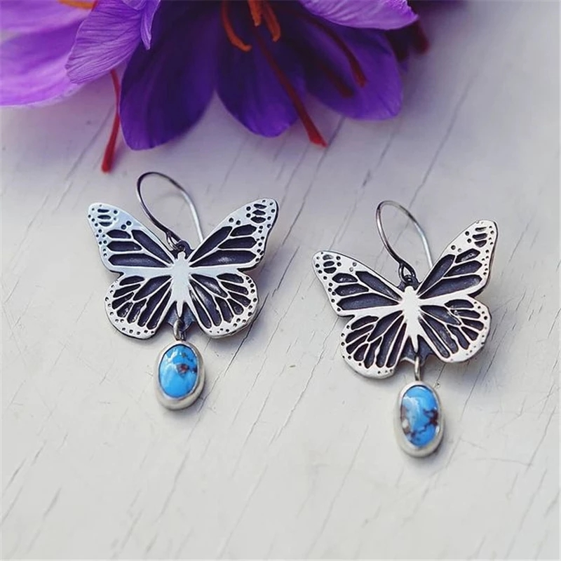 Boucles d'oreilles Vintage Papillon avec Pierre Bleue en Argent