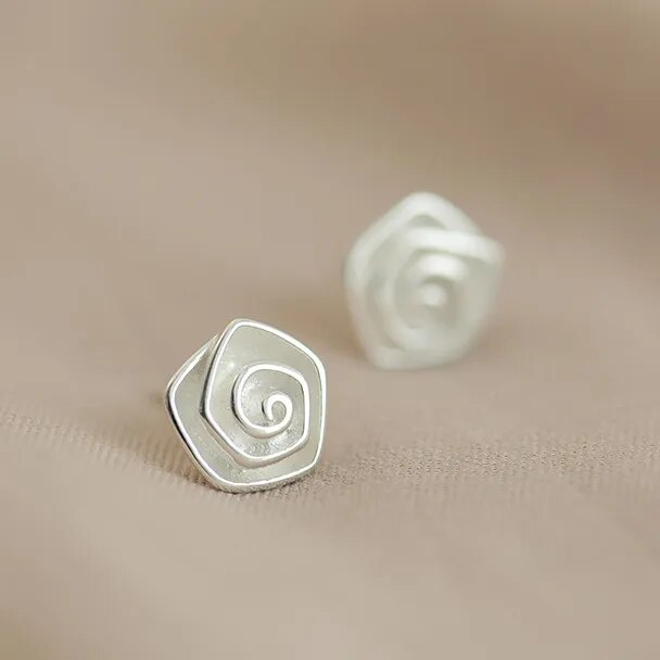 Boucles d'oreilles vintage en forme de fleur blanche