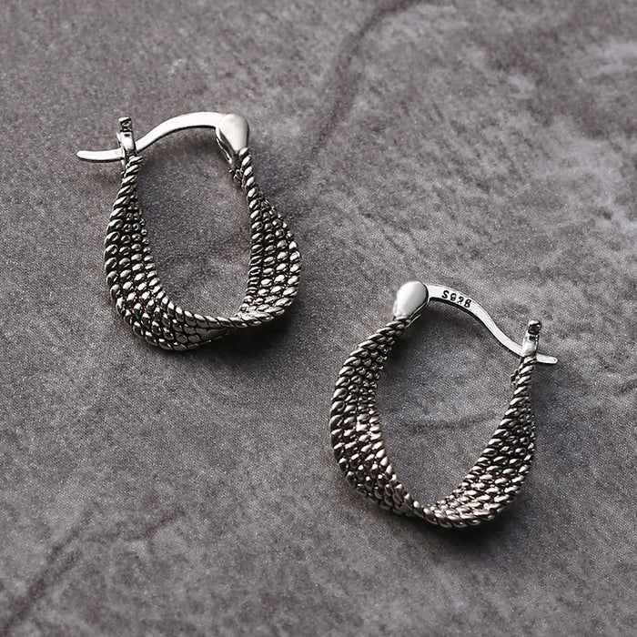 Boucles d'oreilles vintage en maille irrégulière en argent