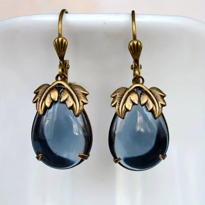 Boucles d'oreilles vintage en cristal bleu plaqué or