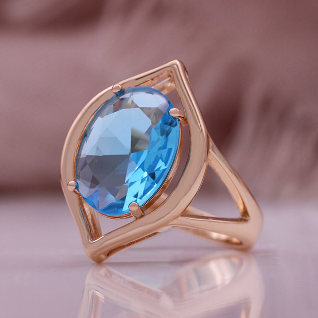 Bague vintage en or rose et cristal bleu