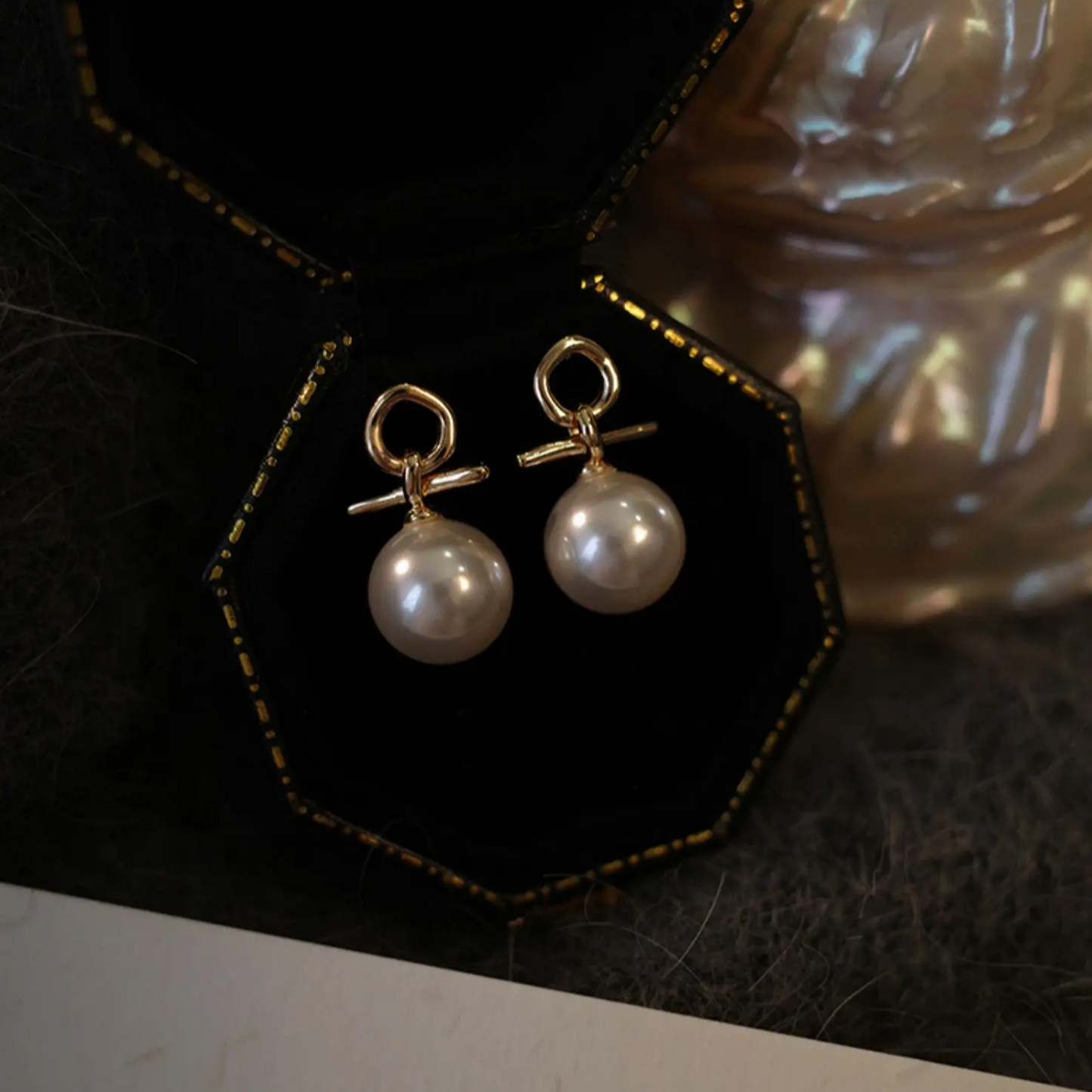 Boucles d'oreilles en perles avec nœud élégant