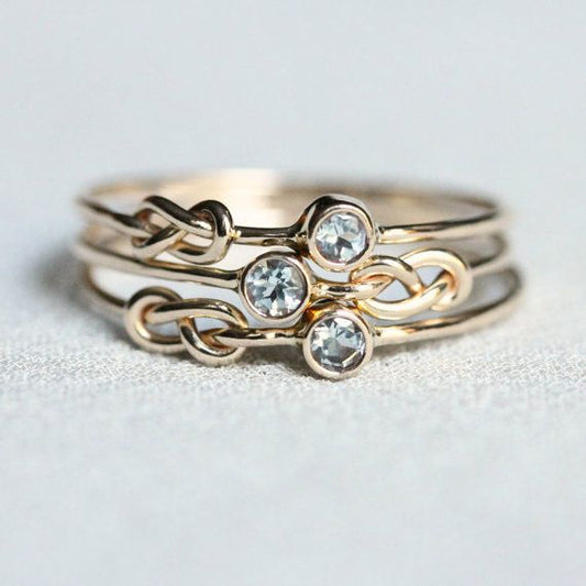 Bague multicouche en or forgé à l'infini et zircon vintage