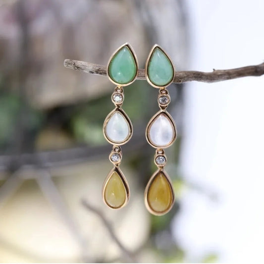 Boucles d'oreilles nature vintage avec pierres enchevêtrées