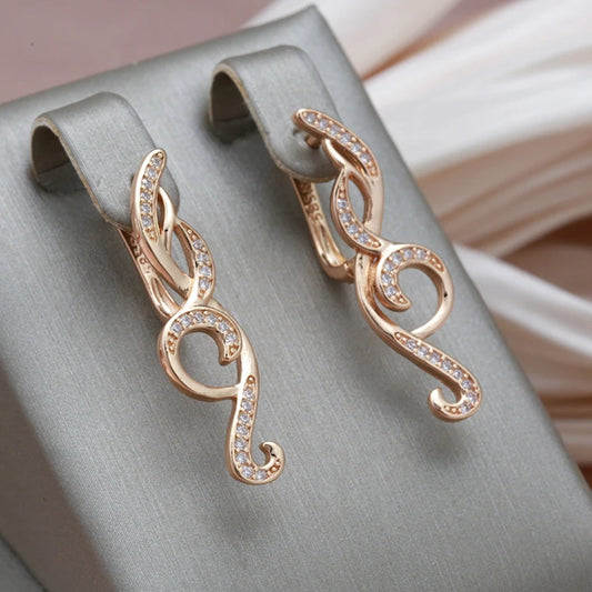 Boucles d'oreilles pendantes en forme de vagues brillantes