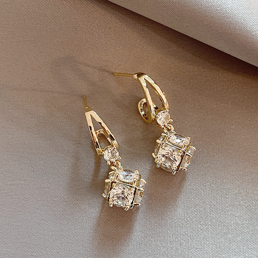 Elégantes boucles d'oreilles en zirconium cubique en or