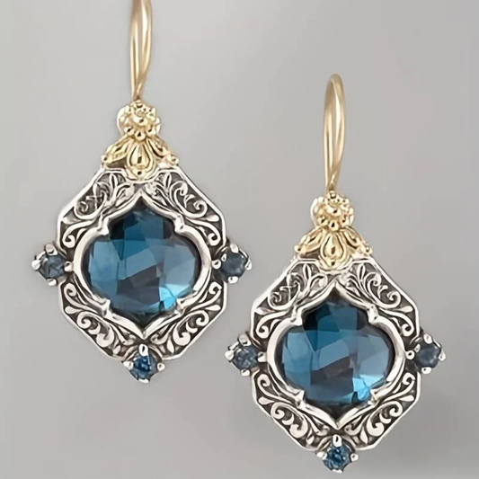 Boucles d'oreilles en cristal bleu en or et argent vintage