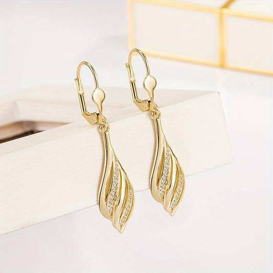 Boucles d'oreilles vintage dorées et brillantes
